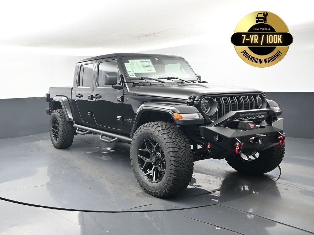 2025 Jeep Gladiator GLADIATOR SPORT S 4X4 SCA Black Widow in Black Clear-Coat Exterior Paint — front three-quarter view