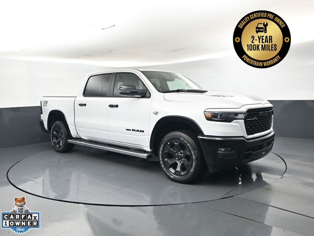 2026 RAM Ram 1500 RAM 1500 BIG HORN CREW CAB 4X4 5'7' BOX in Bright White Clear-Coat Exterior Paint — front three-quarter view