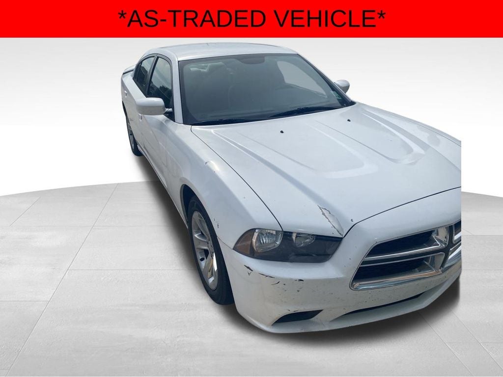 2013 Dodge Charger SE in White — front three-quarter view