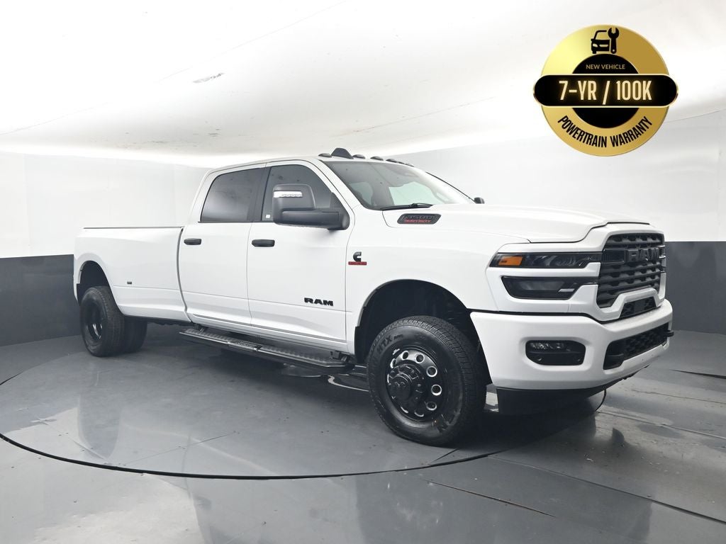 2026 RAM Ram 3500 RAM 3500 BIG HORN CREW CAB 4X4 8' BOX in Bright White Clear-Coat Exterior Paint — front three-quarter view