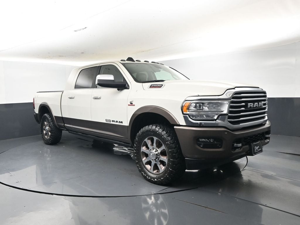 2022 RAM 2500 Longhorn in Pearl White — front three-quarter view