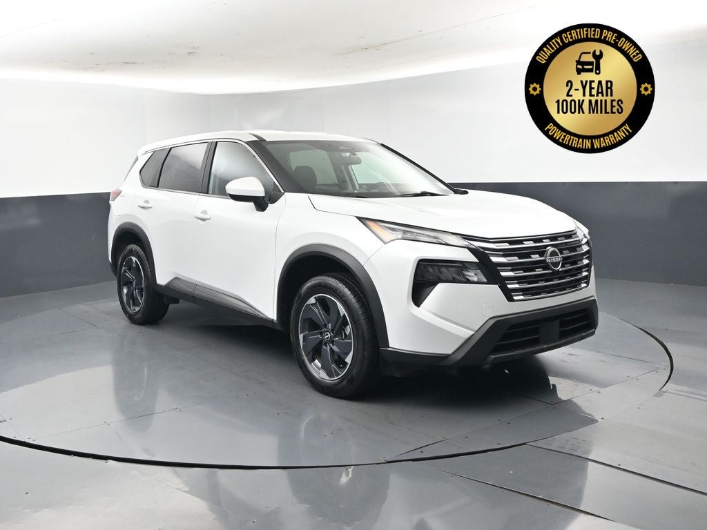2024 Nissan Rogue SV in Glacier White — front three-quarter view
